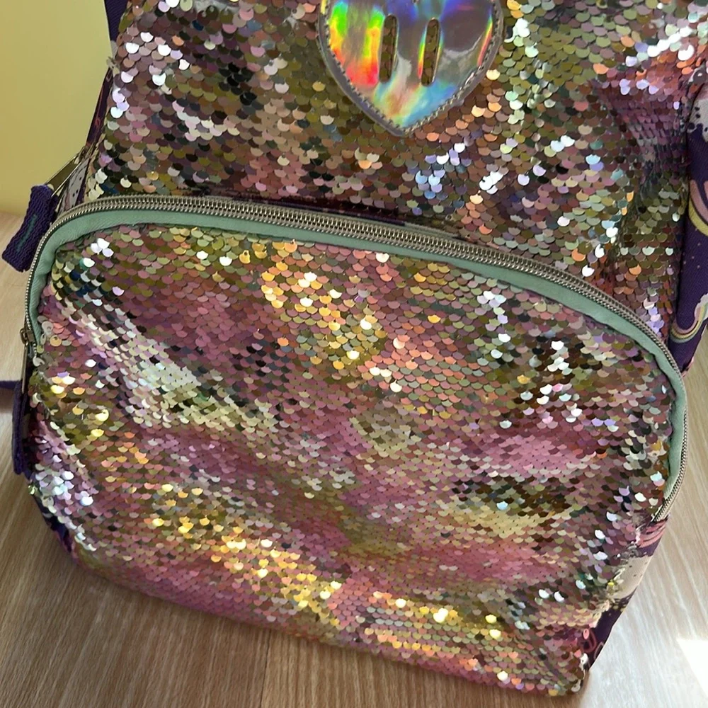 Purple rainbows and sparkles backpack